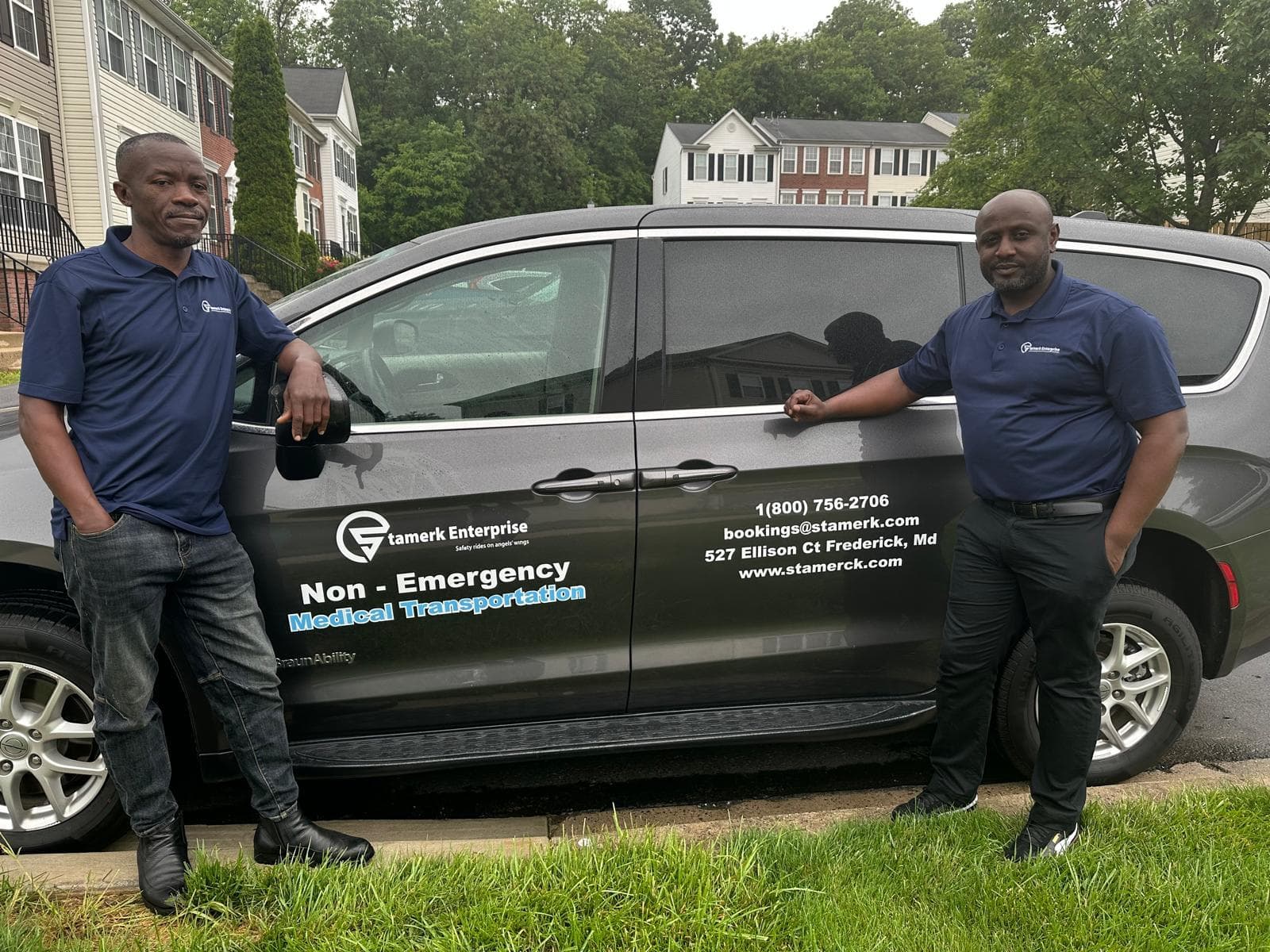 Solomon Byaruhanga and the Stamerck Enterprise team with company vehicle